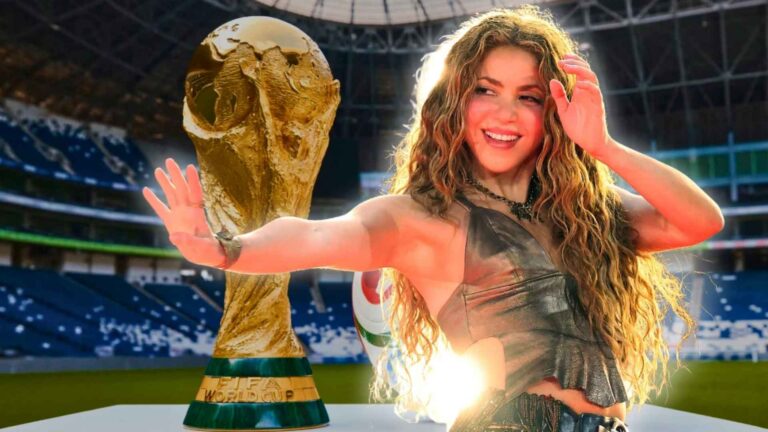 Shakira posando junto al trofeo de la Copa Mundial FIFA frente a un estadio de fútbol, imagen promocional de "Dai Dai", canción oficial del Mundial 2026